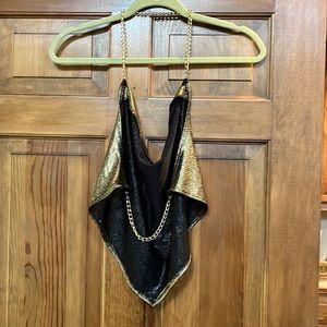 Halter style crop shimmer top with gold chain neck strap and back strap